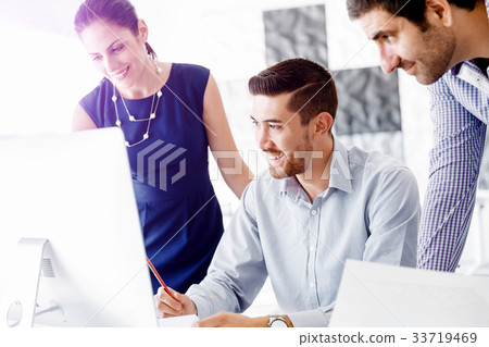 Business people in modern office 33719469