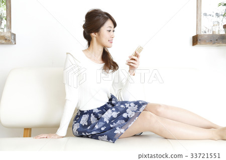 A woman relaxing in the room 33721551
