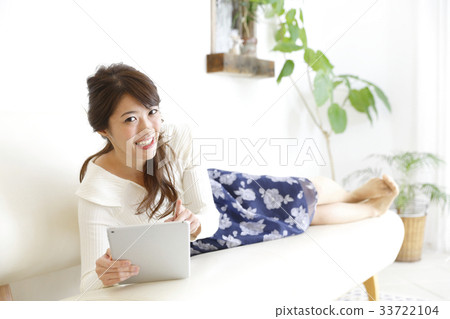 A woman relaxing in the room 33722104