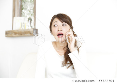 A woman relaxing in the room 33722704