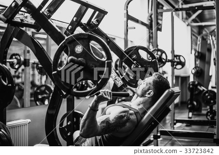 Man doing an exercise for the shoulders in the 33723842