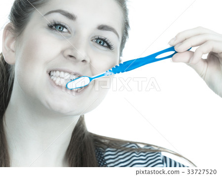Woman brushing cleaning teeth. Woman brushing cleaning teeth. 33727520