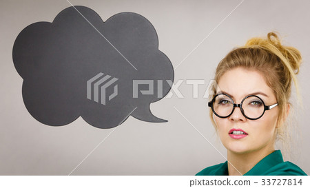 Confident rude business woman with thinking bubble 33727814