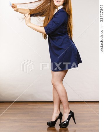 Happy positive woman with long brown hair 33727845