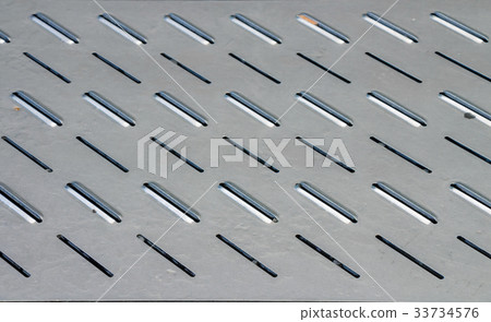 Seamless metal oval holes plate texture Seamless metal oval holes plate texture 33734576