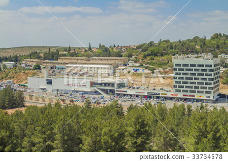 Shops and boutiques in open mall in ariel city 33734578