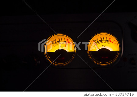 Analog vu meters glowing on black background Analog vu meters glowing on black background 33734719