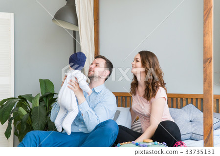 Happy Young Attractive Family with Baby. Happy Young Attractive Family with Baby. 33735131