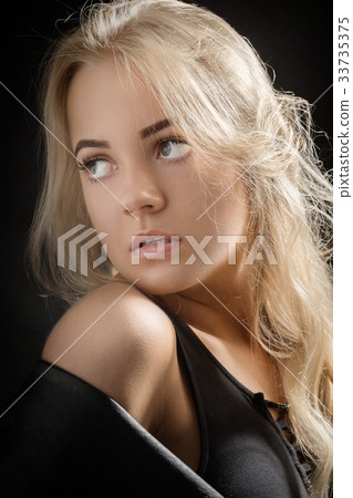 woman looking back woman looking back 33735375