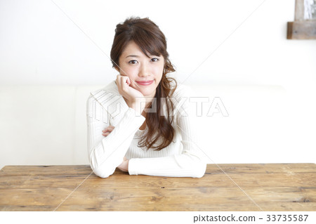 A woman relaxing in the room 33735587