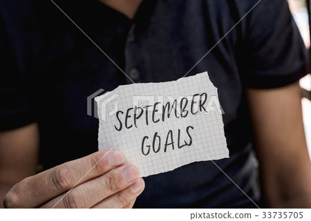 man with a note with the text september goals man with a note with the text september goals 33735705