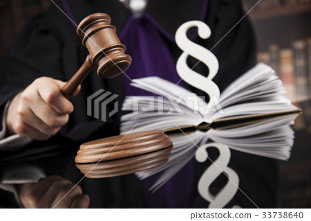 Justice and law concept. Male judge in a courtroom Justice and law concept. Male judge in a courtroom 33738640