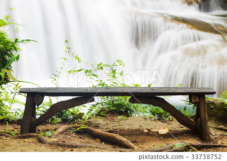 wood bench for relaxing at waterfall 33738752