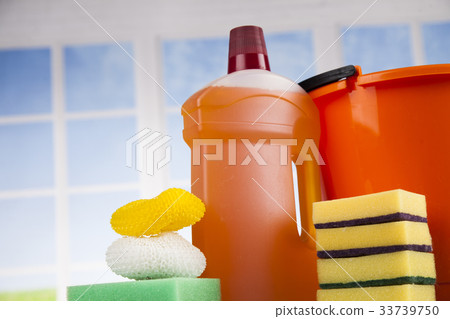 House cleaning product on wood table and window 33739750