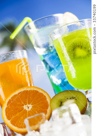 Summer drink,palm branch and Fresh tropical fruits Summer drink,palm branch and Fresh tropical fruits 33740199