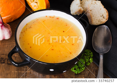 Pumpkin cream soup in bowl Pumpkin cream soup in bowl 33740257