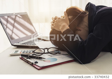 Stressed and frustrated asian business woman 33740432