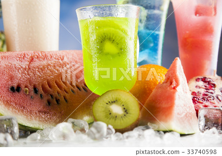 Summer drink,palm branch and Fresh tropical fruits 33740598