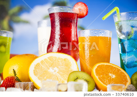 Summer drink,palm branch and Fresh tropical fruits Summer drink,palm branch and Fresh tropical fruits 33740610