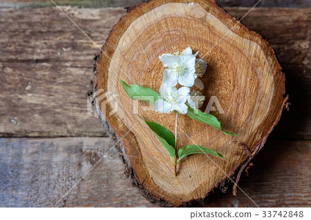 Jasmine on a wooden table Jasmine on a wooden table 33742848