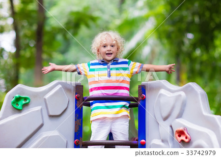 Child on school playground. Kids play. 33742979