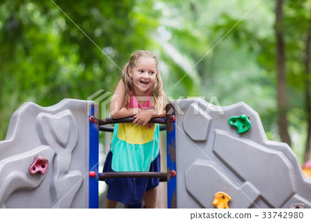Child on school playground. Kids play. Child on school playground. Kids play. 33742980