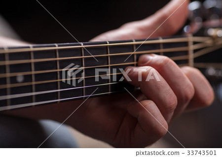 Acoustic guitar player Acoustic guitar player 33743501