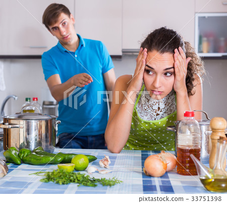 person criticizing young spouse 33751398