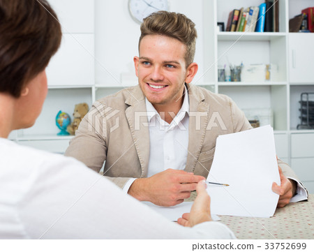 man tells woman about interesting offers man tells woman about interesting offers 33752699