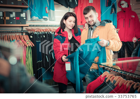 Couple deciding on track jacket 33753765