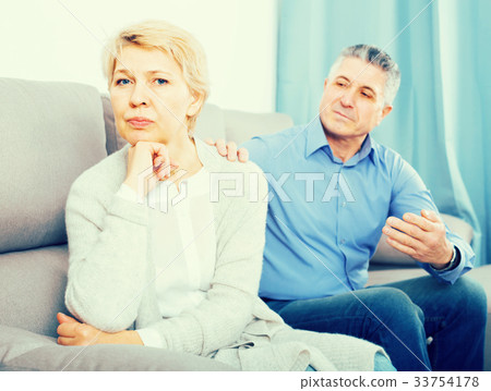 resentful mature couple quarreling at home with each other 33754178