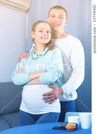 Husband and wife expecting child Husband and wife expecting child 33754482