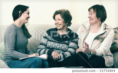 Senior women consulting with banking agent Senior women consulting with banking agent 33754804