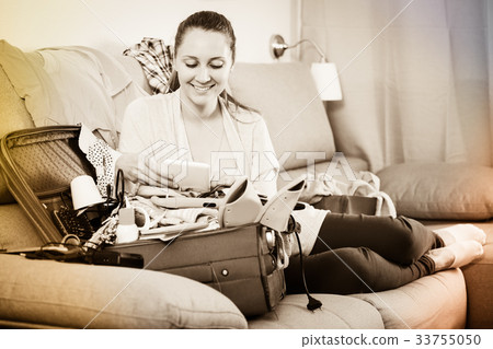 Woman getting ready for holidays 33755050