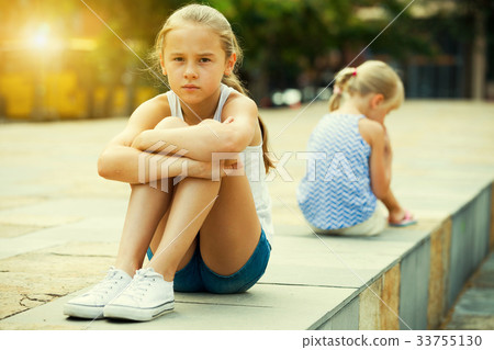 Small sisters upset after quarrel outside 33755130