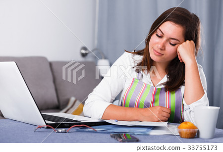 Housewife searching for recipes Housewife searching for recipes 33755173