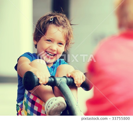 Children having fun at playground 33755800