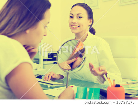 Consultation in aesthetic medicine center 33757173