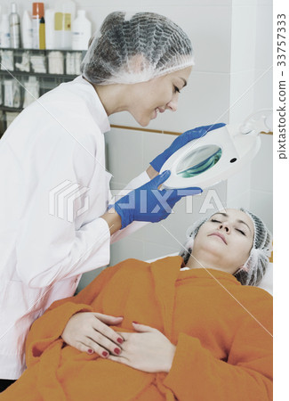 Young client ready for beauty procedures 33757333