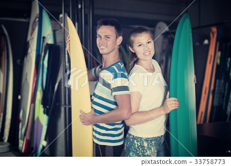 Portrait of man and woman satisfied in nautical shop 33758773