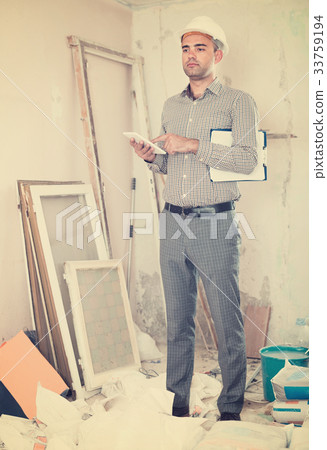 worker with tablet in the hand worker with tablet in the hand 33759194