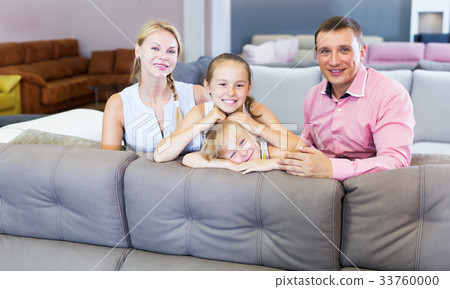 Family choosing sofa in store Family choosing sofa in store 33760000