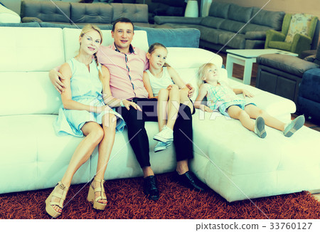 Parents with kids is pleased by new sofa 33760127