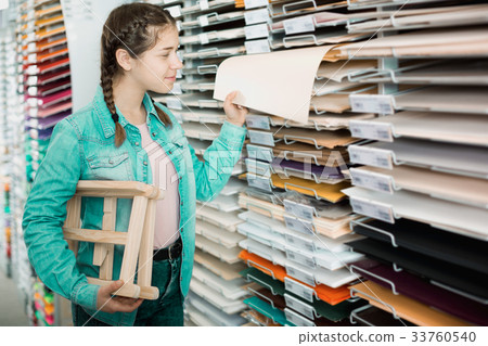 Smiling girl shopping multicolored paper Smiling girl shopping multicolored paper 33760540