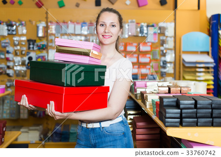 Adult girl with gift boxes 33760742