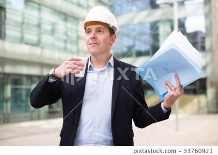 cheerful man working and drinking coffee cheerful man working and drinking coffee 33760921
