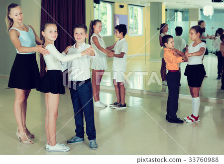 Children enjoying of partner dance Children enjoying of partner dance 33760988