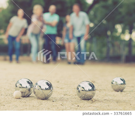 people playing petanque at leisure people playing petanque at leisure 33761665