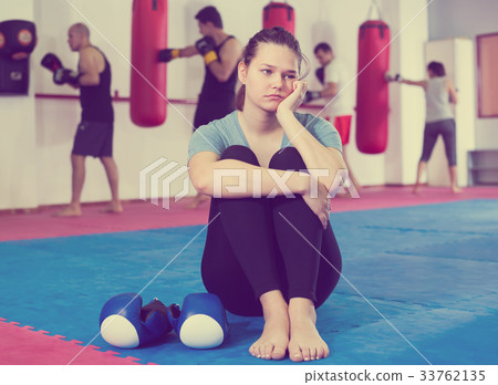 boxer girl is waiting start of training 33762135