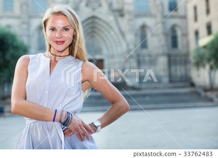 cheerful woman in the dress at the street 33762483